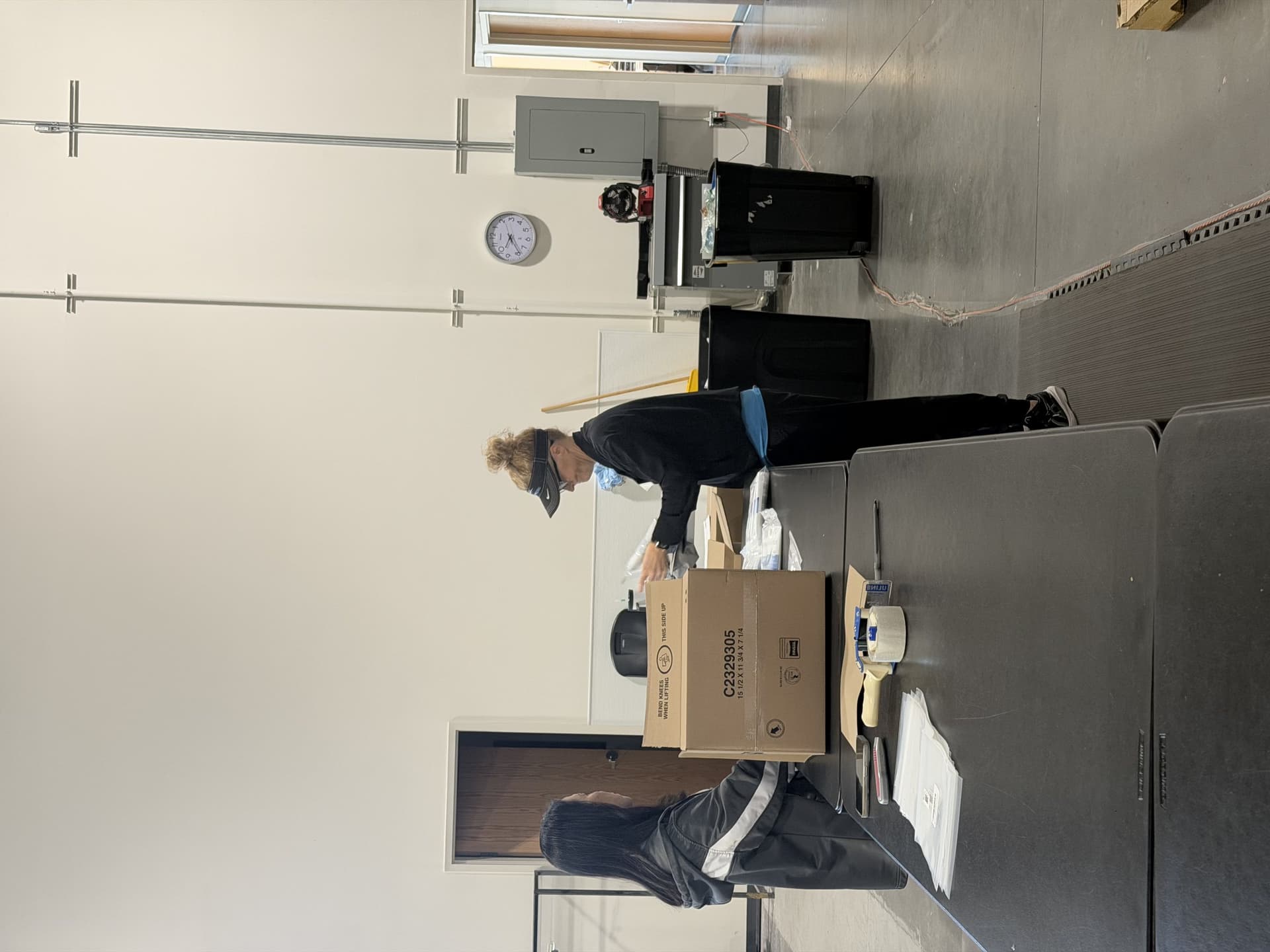 Team member at packing station